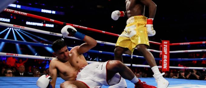 Terence Crawford dominates Amir Khan before farcical low-blow ending